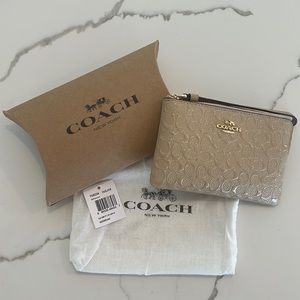 Brand New Cream/Tan AUTHENTIC Coach Patent Leather Wristlet with “Double C”